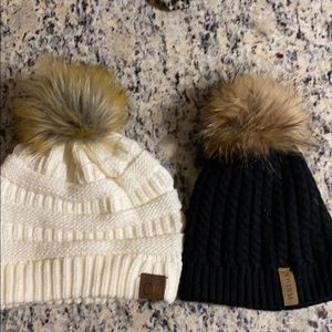 White hat with fur ball and black hat (bundle)